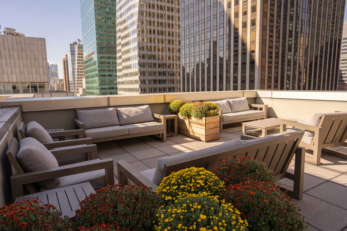 outdoor-furniture-on-rooftop-deck-with-landscaping
