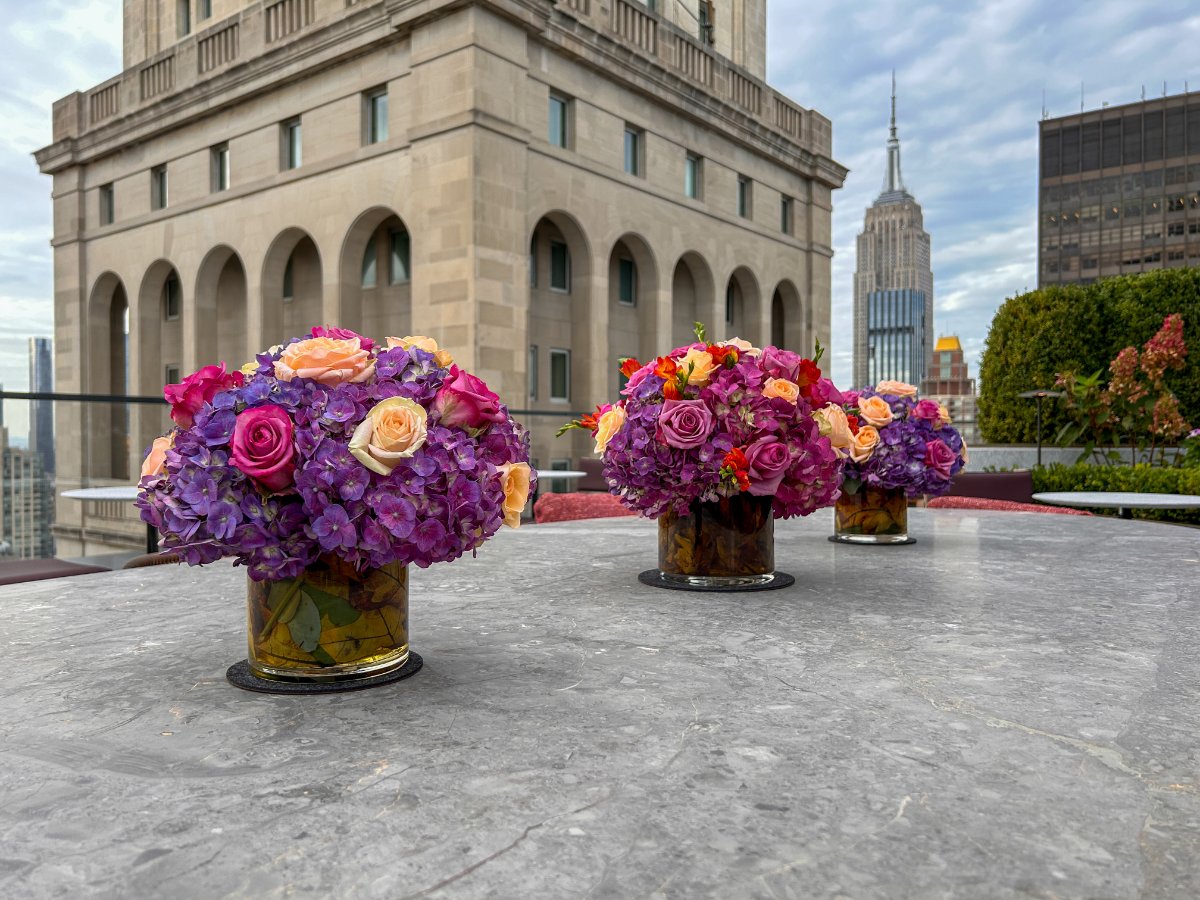 floral-arrangements-on-city-building-rooftop