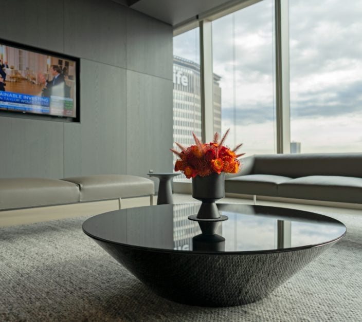 fall floral arrangement in corporate office waiting area with city skyline views in New York City